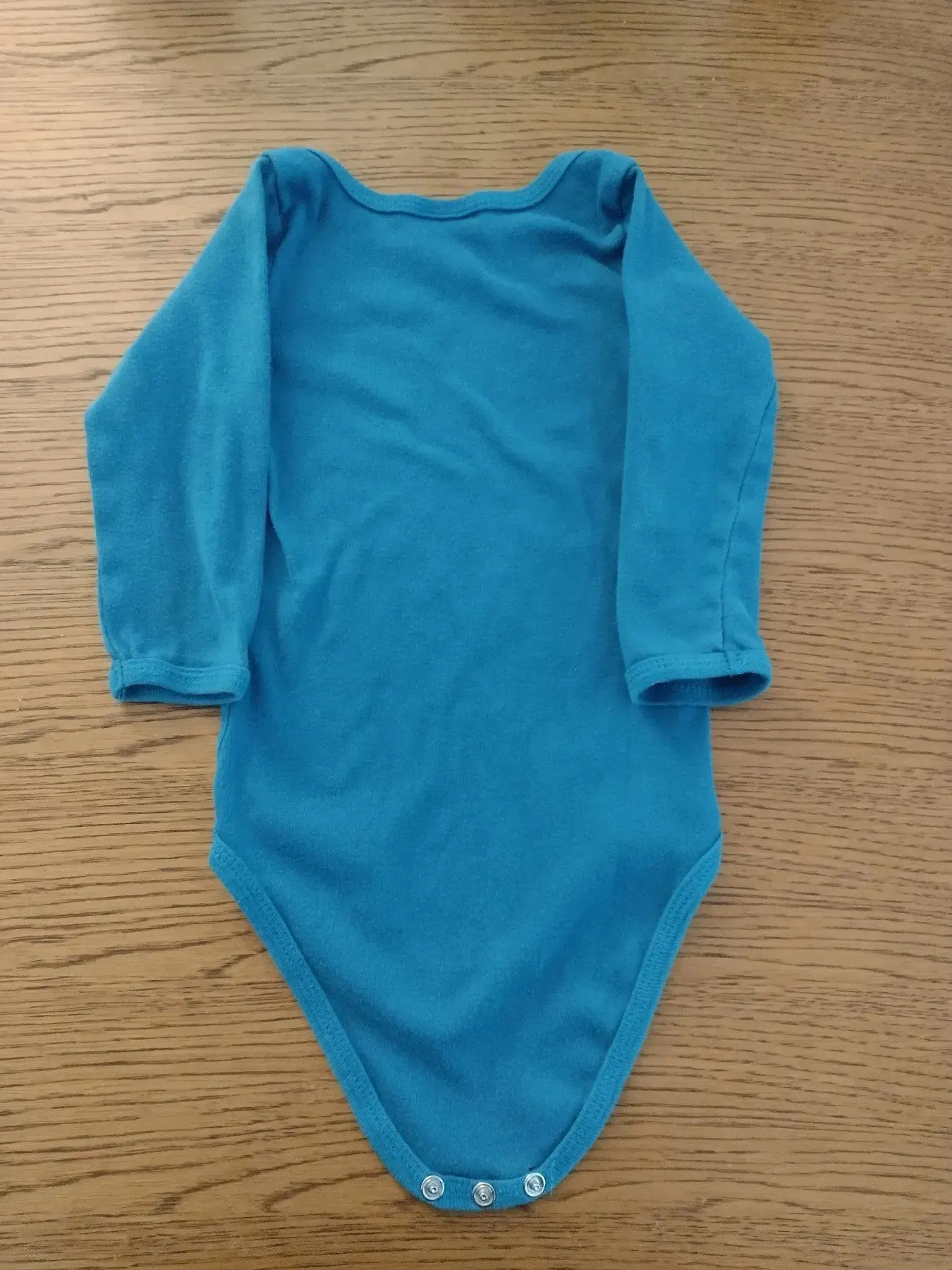 Langarmbody türkis Fisch 86/92