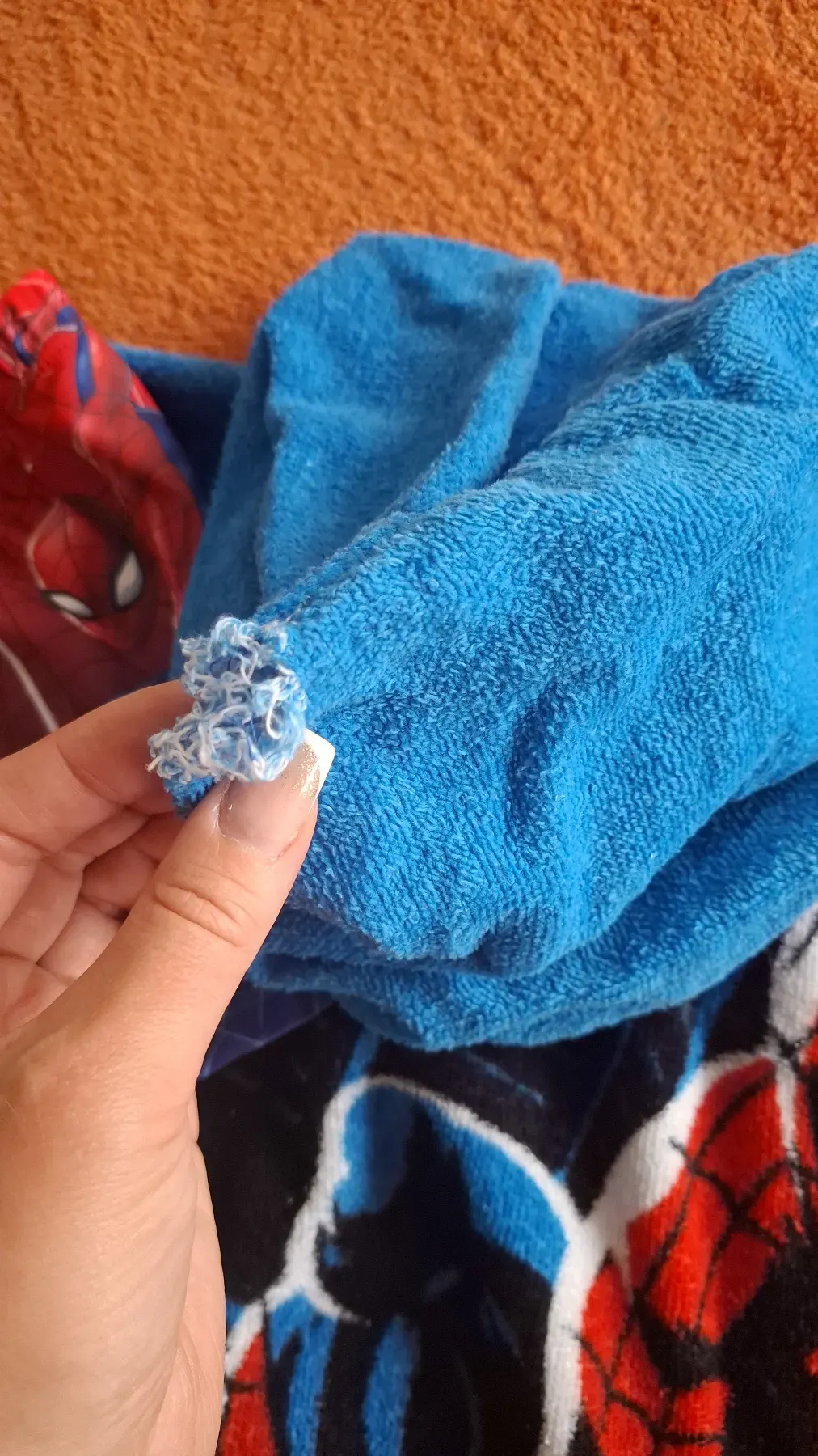 Badehose und Poncho