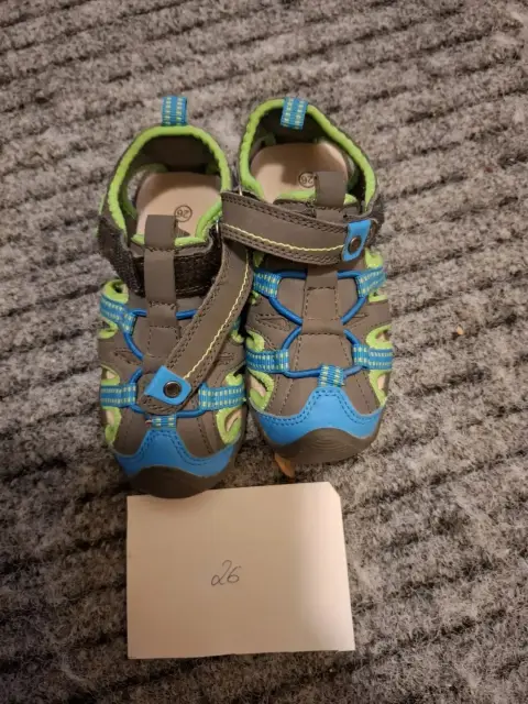 Sandalen ungetragen