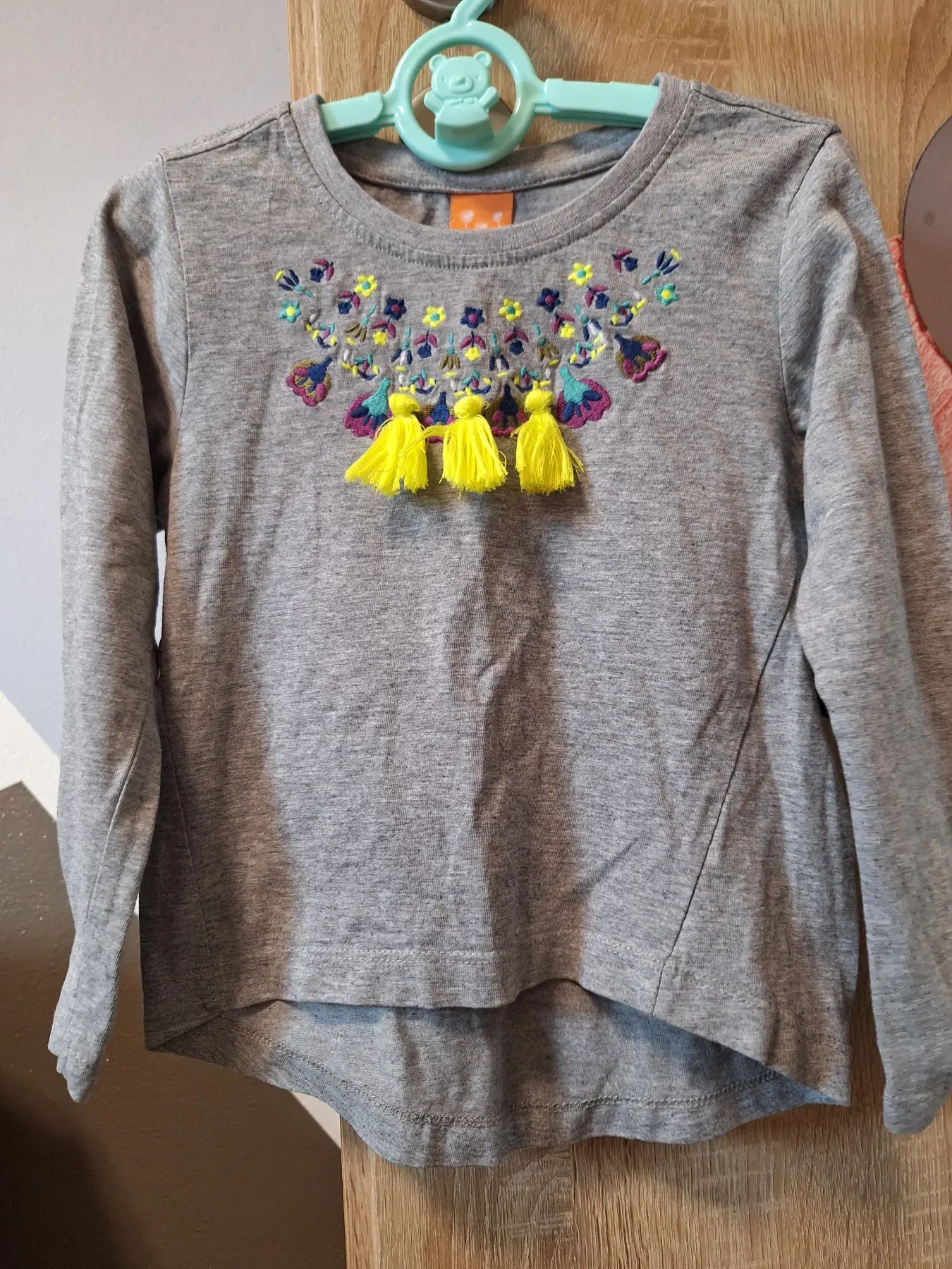 Shirt Bommel Pusblu 104, haben es eher getragen