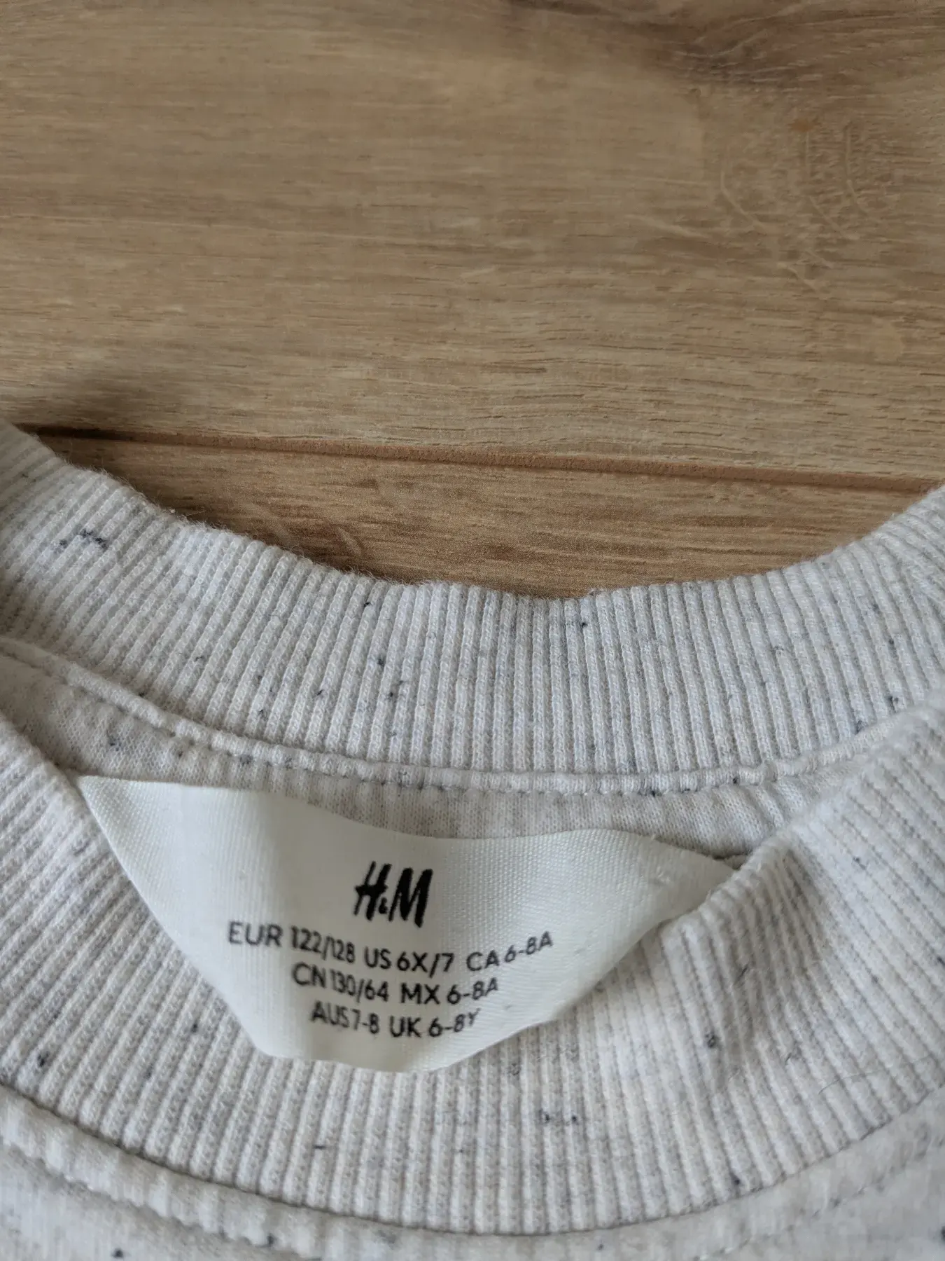 Weiß mellierter Pullover von h&m
