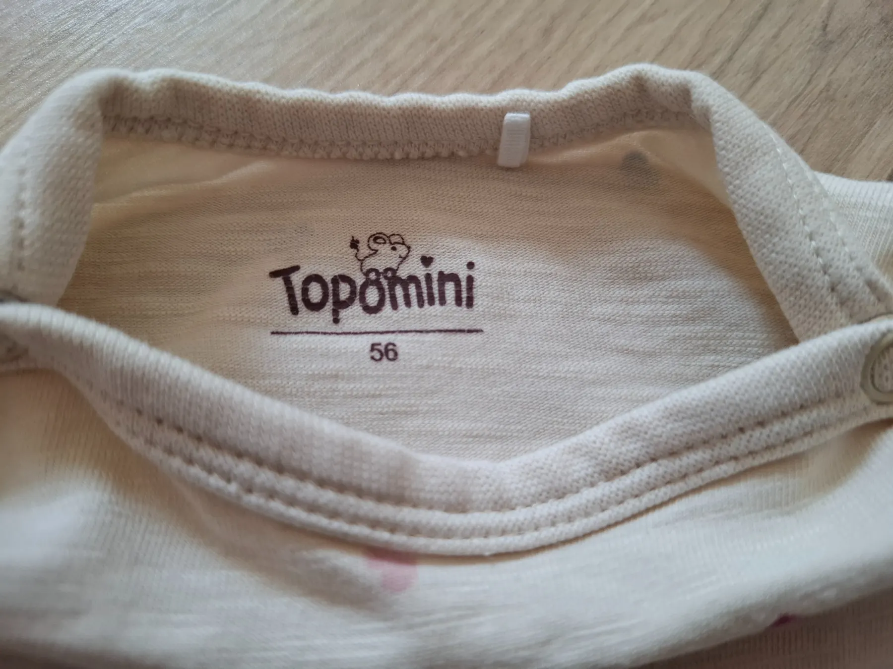 Cremefarbener langarm Body mit Herzen | Größe 56 | Topomini.